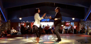personajes de Pulp Fiction bailando con la música de artistas que no fue generada con inteligencia artificial.- Blog Hola Telcel